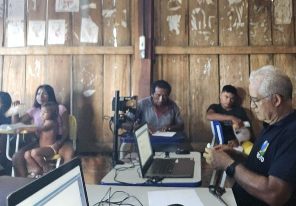 Atendimentos itinerantes do TRE-TO são realizados em aldeias indígenas da etnia Krahô em Itacajá Indígenas sendo atendidos.