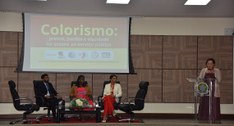 A imagem mostra um evento institucional promovido pelo TRE-TO sobre colorismo e equidade no aces...