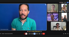 A imagem mostra uma reunião virtual realizada por videochamada, com seis participantes conectado...